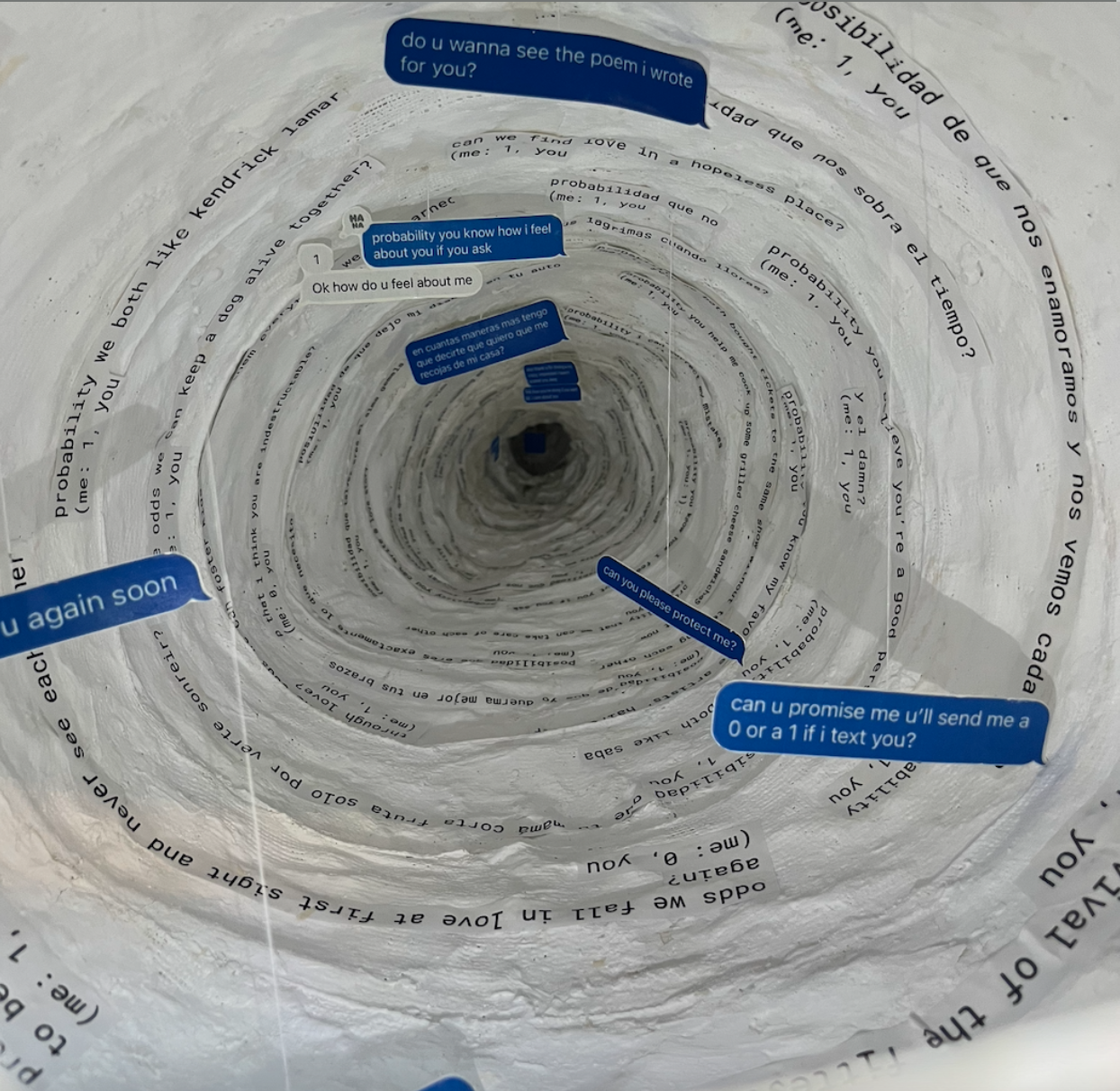 Zoomed in photo on white tunnel with writing on sides (referring to romantic probabilities) and hanging text messages